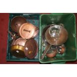A collection of mixed copper cooking pans