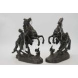 A pair of spelter models of the Marly horses, height 28cm