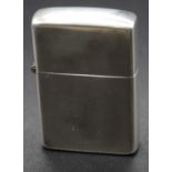 A Tiffany & Co sterling silver cased pocket cigarette lighter, after Zippo, 4.8cm
