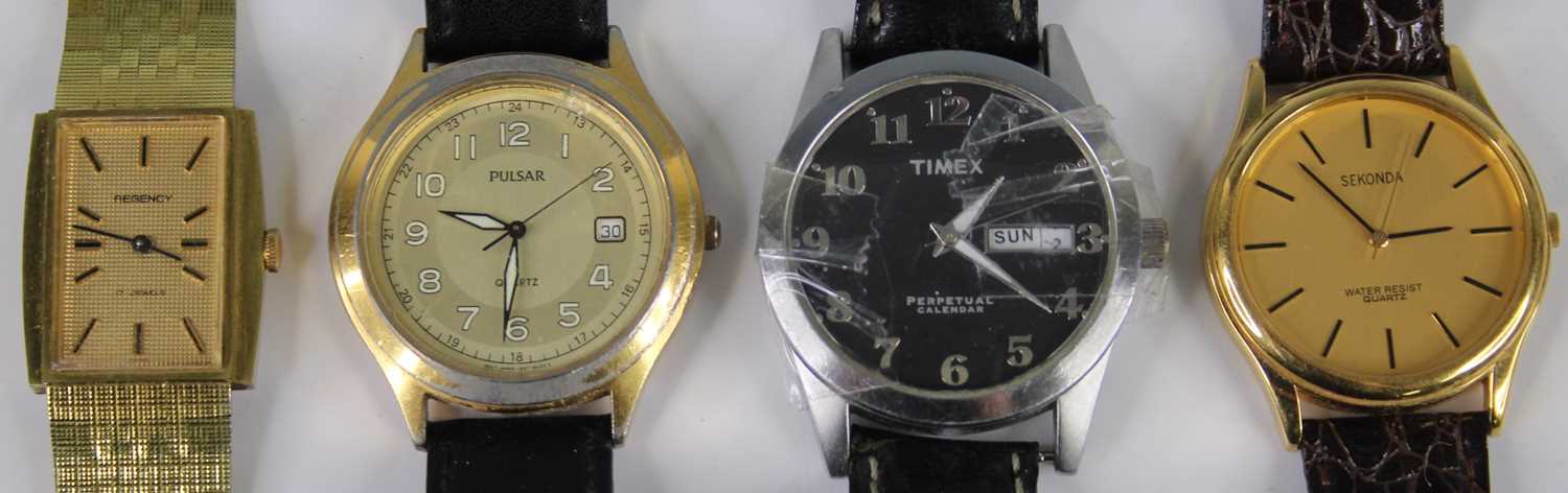 Four various fashion watches, to include Timex and Sekonda examples