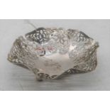 A George VI silver bonbon dish of pierced hexagonal form on ball feet, weight 3.2oz