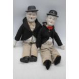 A pair of vintage bisque headed Laurel & Hardy dolls, largest height 47cm
