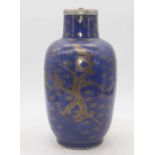 A Chinese blue glazed stoneware vase, gilt decorated with four clawed dragons, later converted