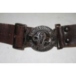 A vintage Boy Scouts leather belt, the buckle inscribed Be Prepared