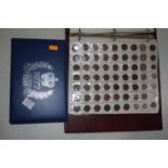 A collection of British coinage, housed in an album; together with an album of first day covers