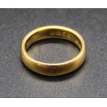 A 22ct gold wedding band, sponsor W.W. Ltd, 8.1g, size O/P