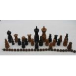 A collection of turned box wood and ebony chess pieces (broken and incomplete), height of king 12cm,