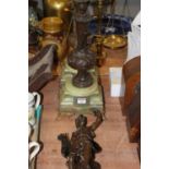 A pair of adjusted spelter and onyx candlesticks, height 46cm, together with a spelter figure of a