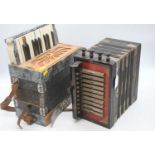 A vintage Ajax Reeds Champion Band squeezebox, together with a Stelpini accordion