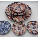 A Japanese Imari charger, of lobed form, dia. 45cm, together with another smaller, and four