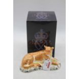 A Royal Crown Derby model of a lioness, Gold button, h.11cm, boxedNo Damage