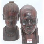 A pair of African carved hard wood head & shoulder busts, largest height 25cm