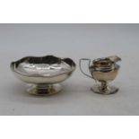 A George V silver bonbon dish of shaped circular form on domed foot, together with an Edwardian