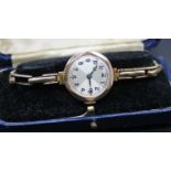 A lady's vintage 9ct gold cased wristwatch, having manual wind movement and on gilt metal