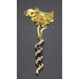 A modern 9ct gold three sapphire set pendant, 26mm, on finelink neck chain, 3.1g