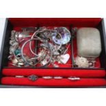 A jewellery box and contents to include paste set dress rings, various bangles, etc