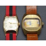A gent's Bulova gilt metal and steel cased manual wind tank watch, with signed silvered dial, case