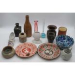 A collection of ceramics to include a relief moulded bachelor's teapot, and a stoneware bottle