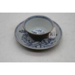 An 18th century Ca Mau Cargo Chinese blue, white and cafe au lait tea bowl and saucer, the largest