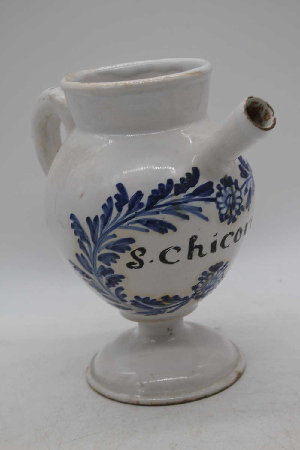 An 18th century French faience wet drug jar, inscribed S.Chicoric, h.22cmHas been restored.