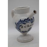 An 18th century French faience wet drug jar, inscribed S.Chicoric, h.22cmHas been restored.
