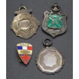 A silver sporting/civilian medal; together with one other; and two metal badges (4)