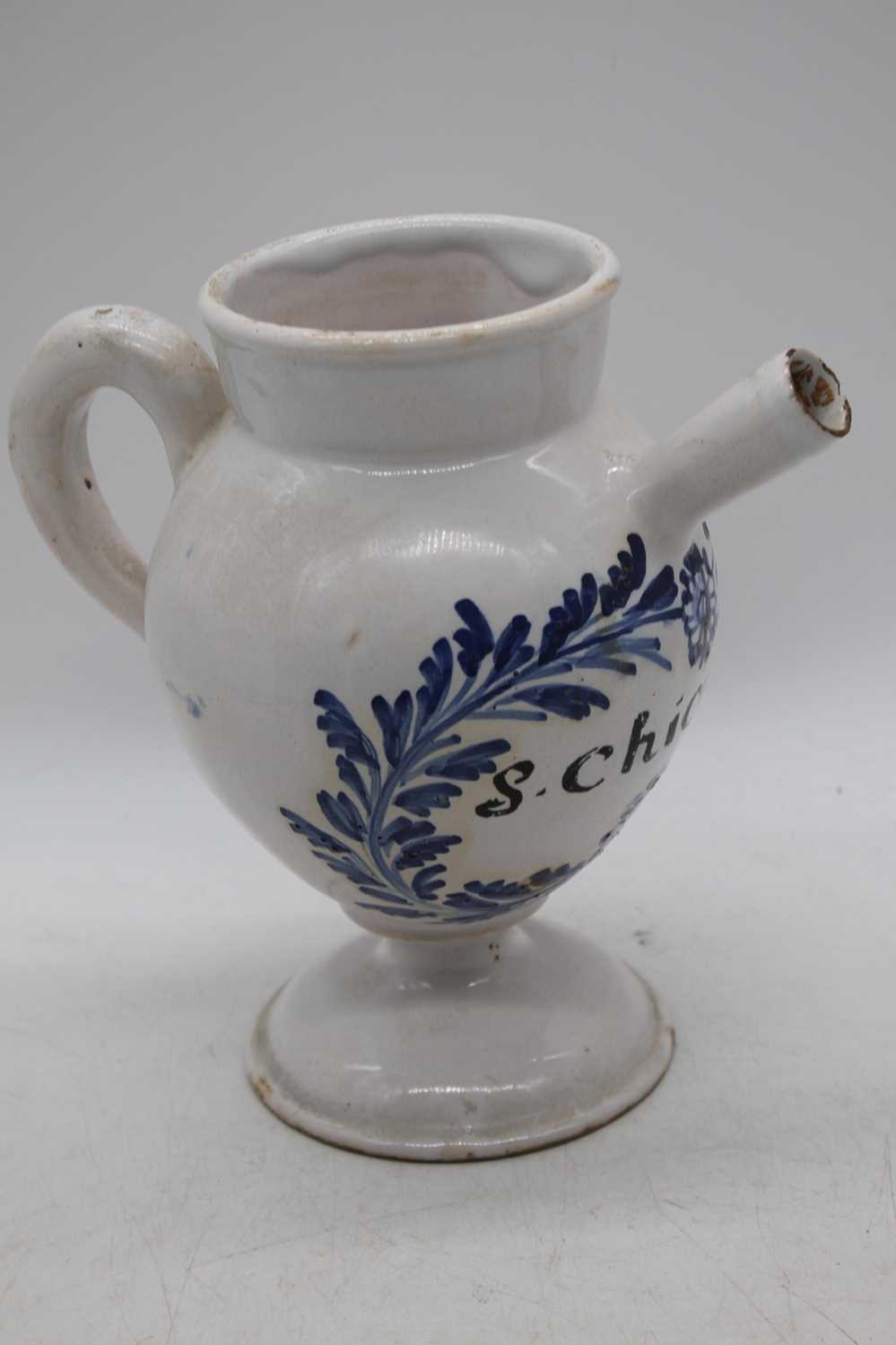 An 18th century French faience wet drug jar, inscribed S.Chicoric, h.22cmHas been restored. - Image 2 of 3