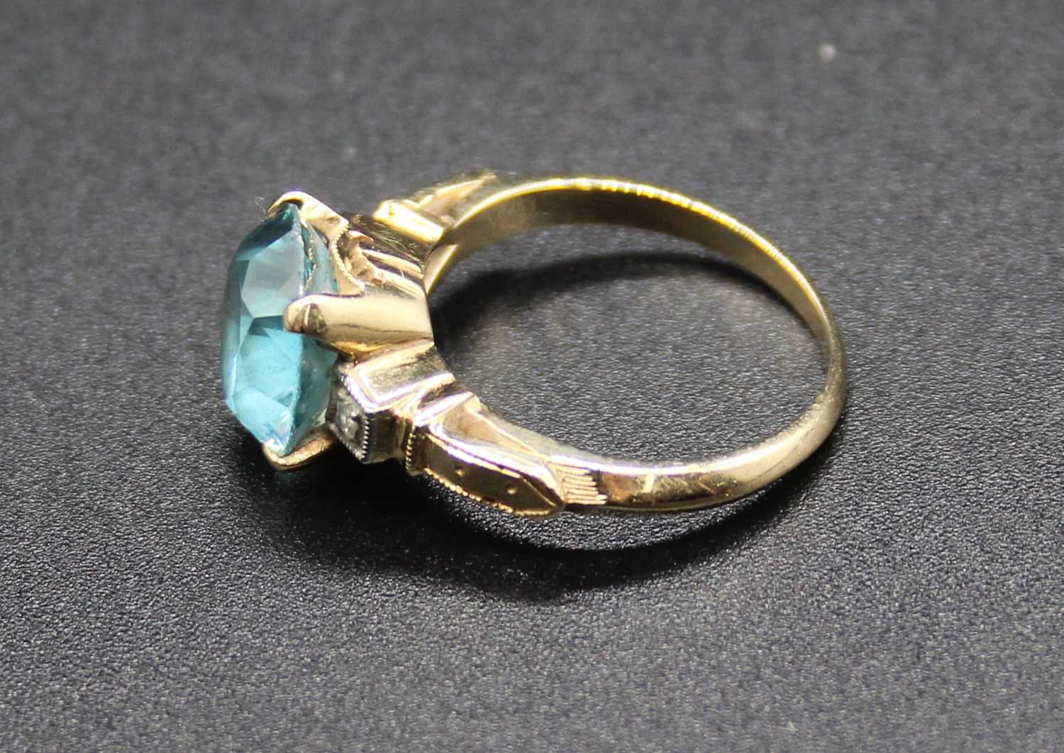 A yellow metal, blue zircon and white sapphire set dress ring, stamped and tested as 14ct, 3.5g, - Image 2 of 2