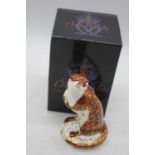 A Royal Crown Derby model of a playful otter, Gold button h.16cm, boxedNo Damage