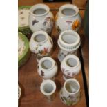 A collection of Portmeirion Botanic Garden pattern vases, largest height 21cmThe largest pair at the