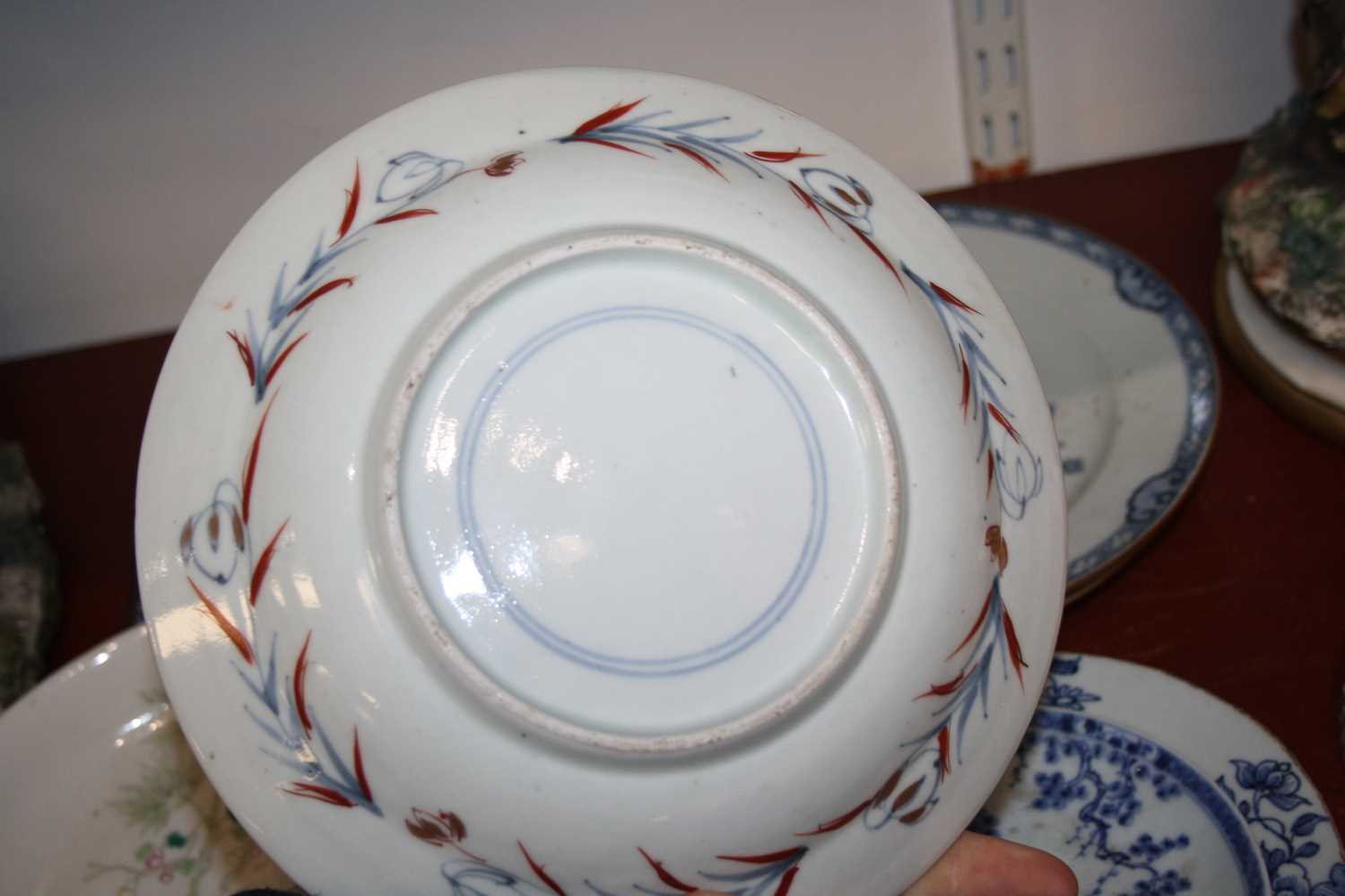 A collection of 18th century and later eastern ceramics, largest 24cm dia. (8)All are cracked - Image 10 of 11