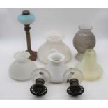 A collection of Victorian and later oil lamp parts