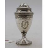 A George III silver pedestal pepperette having beaded border and bright cut decoration on domed