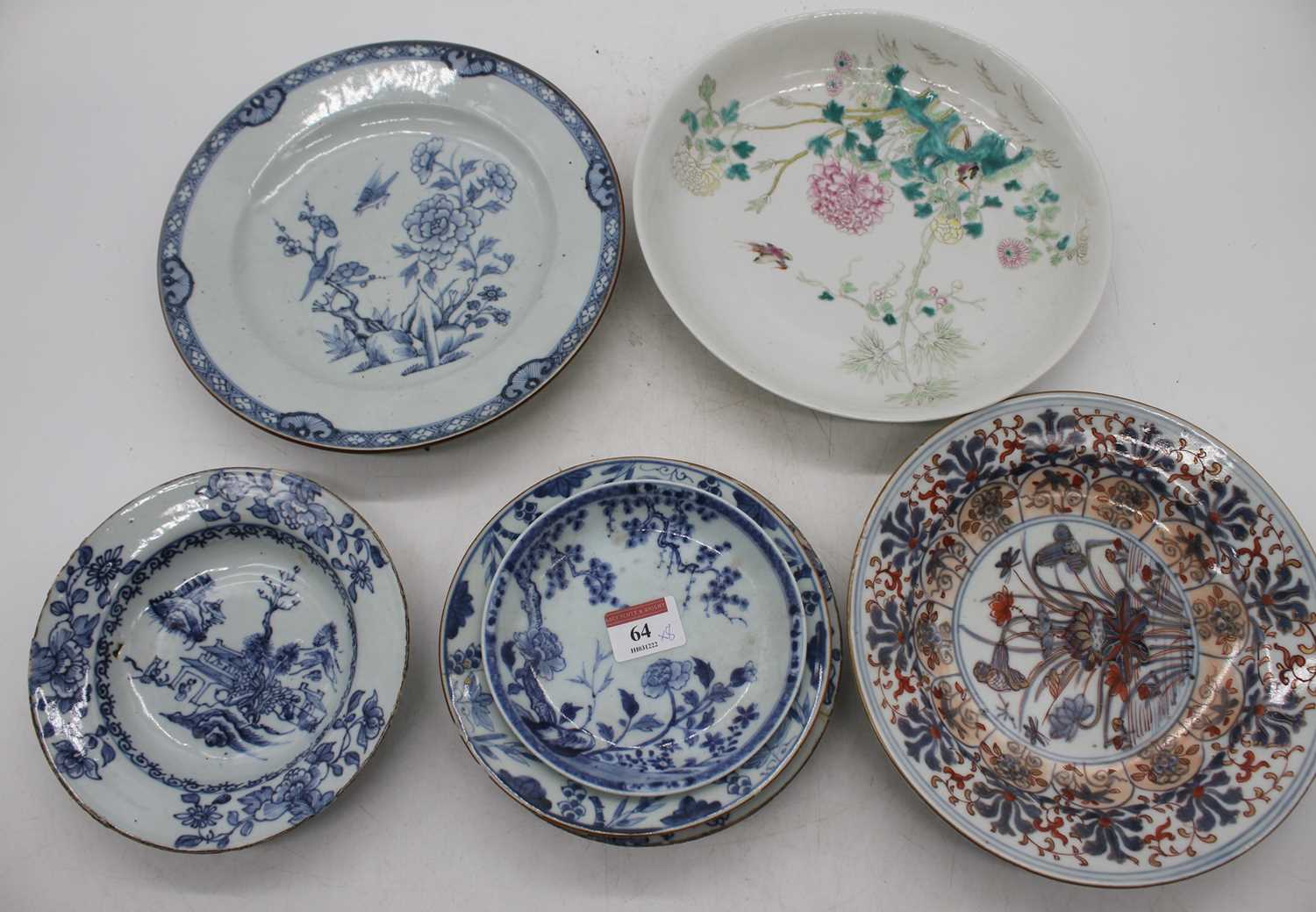 A collection of 18th century and later eastern ceramics, largest 24cm dia. (8)All are cracked