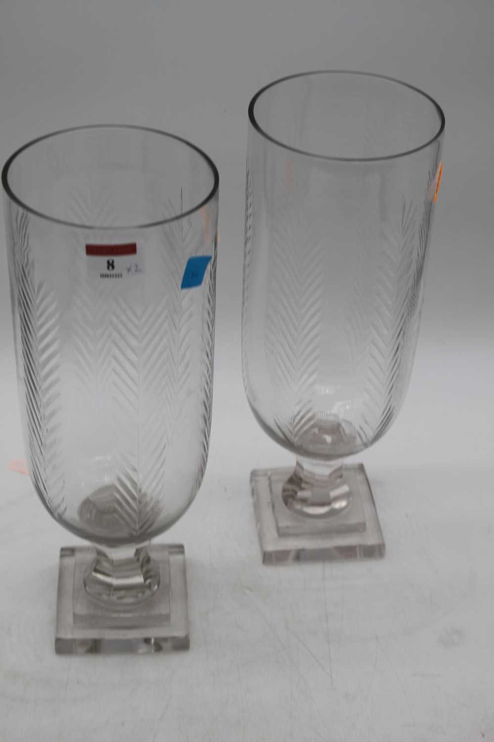 A pair of cut glass hurricane lamps, each on faceted stem and stepped plinth, height 34cm - Image 2 of 2