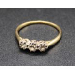 An 18ct gold diamond three stone ring, total diamond weight estimated as approx 0.5 carats, 2.5g,