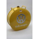 A reproduction Volkswagen yellow painted oil canister, height 36cm