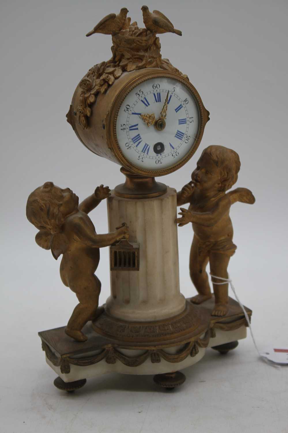 A 19th century French gilt metal figural mantel clock, the enamel dial showing Roman numerals, - Image 2 of 3