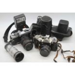 A collection of vintage cameras and photography equipment to include a Minolta SG2 SLR camera, and a