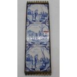 A set of three Delft tin glazed earthenware tiles, each depicting religious scenes, housed within