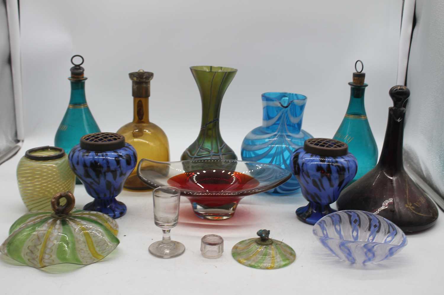 A collection of 19th century and later glass ware to include a pair of 19th century green glass