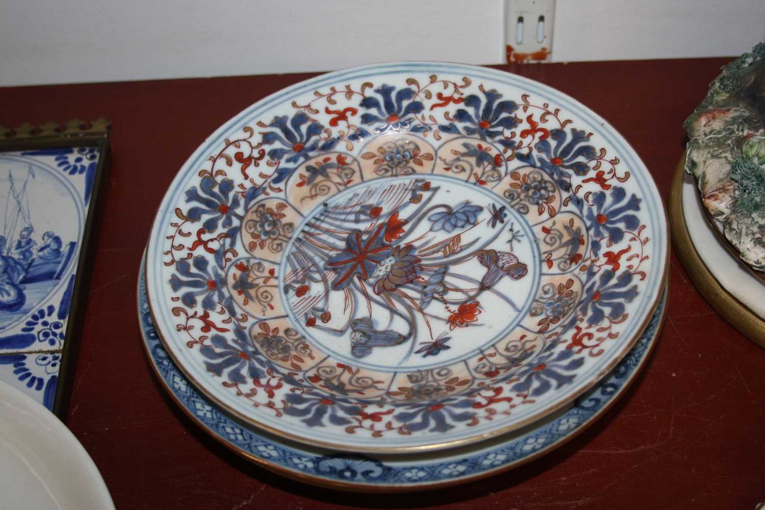 A collection of 18th century and later eastern ceramics, largest 24cm dia. (8)All are cracked - Image 9 of 11