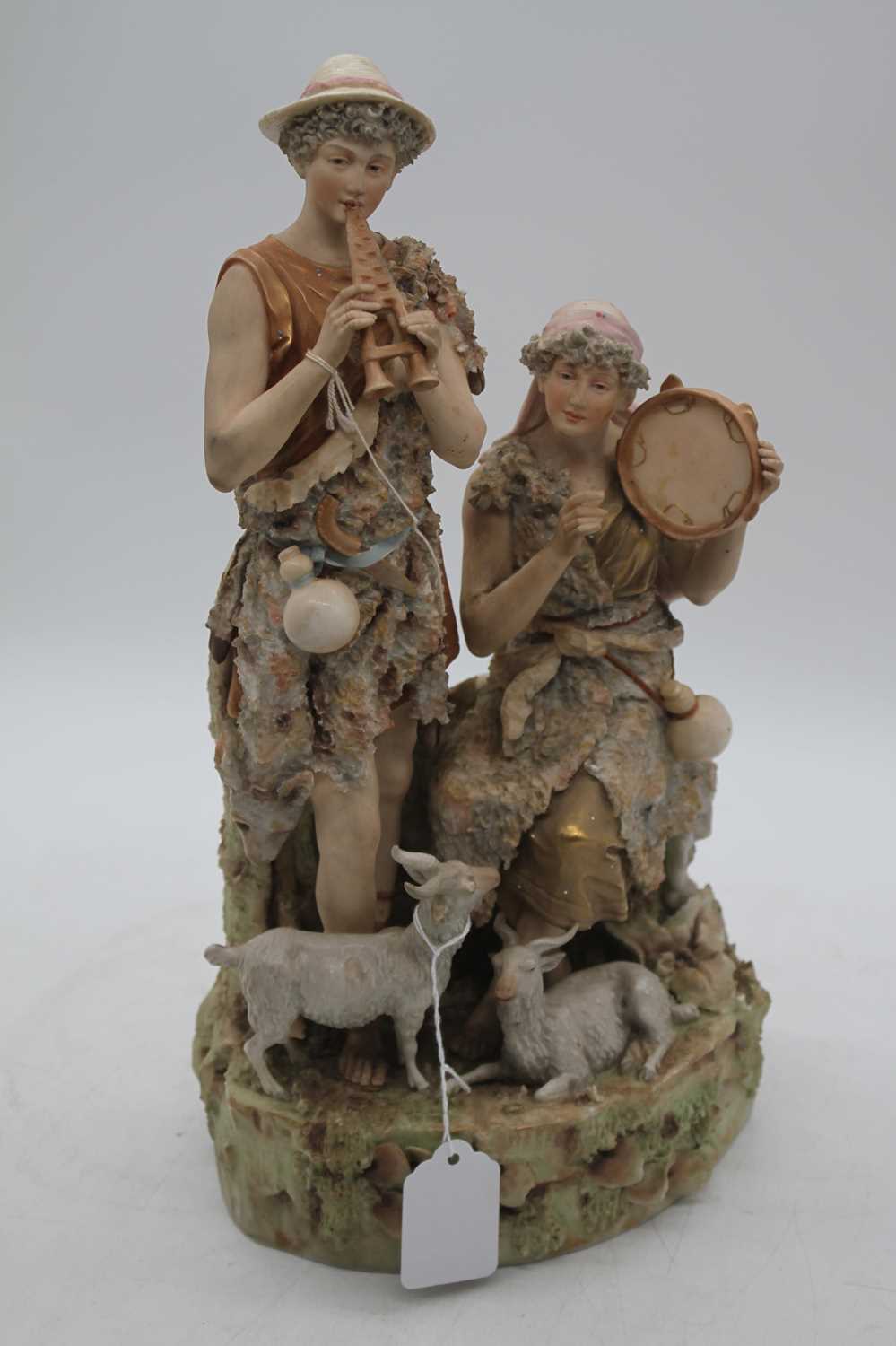 A Royal Dux porcelain figure group, of a pair of musicians, height 37cm