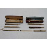 A collection of vintage propelling pencils, to include two cased Yard-O-Led, Charles Letts & Co,