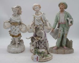 A German porcelain figure of a mother and child, height 23cm; together with three bisque porcelain