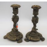 A pair of 19th century brass table candlesticks, in the Rococo taste, h.21cm