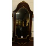 A walnut and gilt composition framed wall mirror, in the George II style, 82 x 36cm