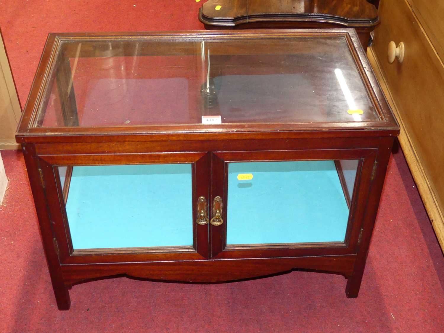 A early 20th century mahogany table top twin door display cabinet, glazed on all sides, width 61.