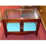 A early 20th century mahogany table top twin door display cabinet, glazed on all sides, width 61.