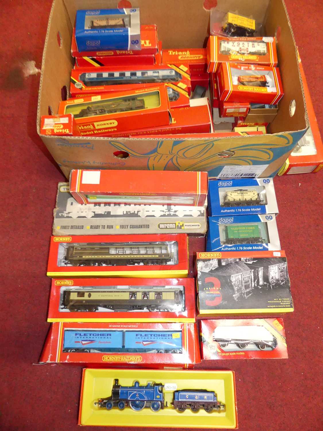 A large collection of mixed 00 gauge boxed wagons, locomotives, and accessories to include a